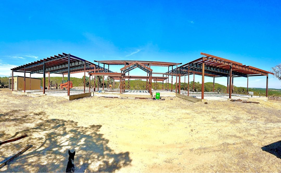 Multi-bay structural steel building frames erected on a Hill Country site by LR Mobile Welding & Contracting